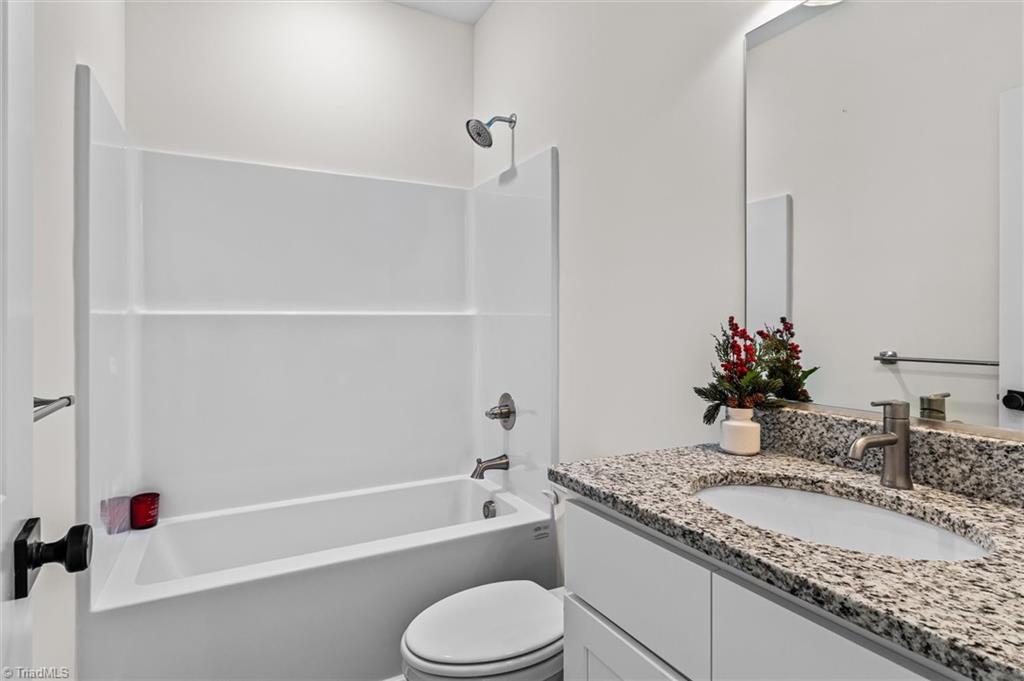 402 North Ward Avenue High Point, NC 27262 - Photo 22 of 28 Bathroom between 2nd and 3rd bedrooms