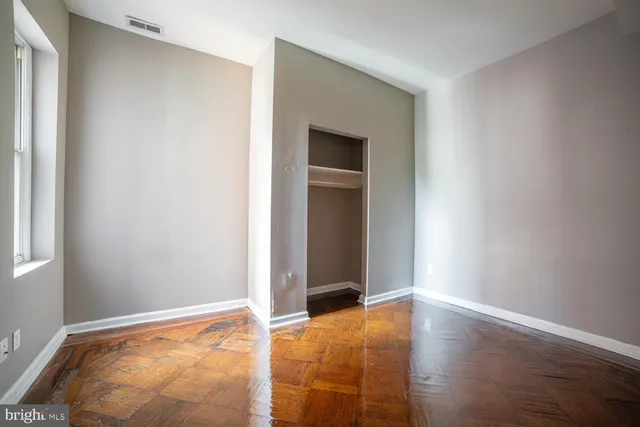 a view of an empty room and window