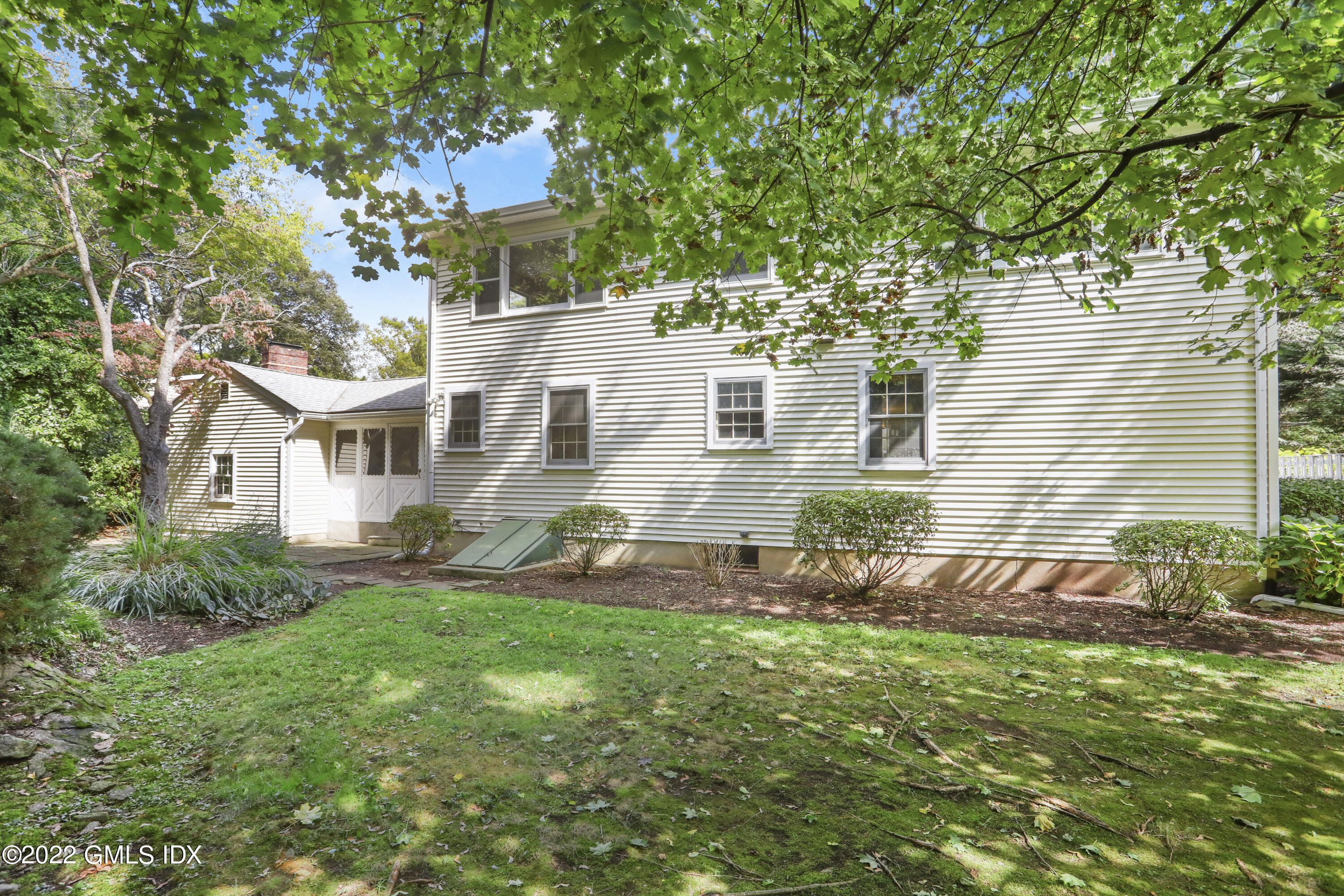 5 Skylark Road Greenwich, CT 06830 - Photo 13 of 21 a front view of a house with garden