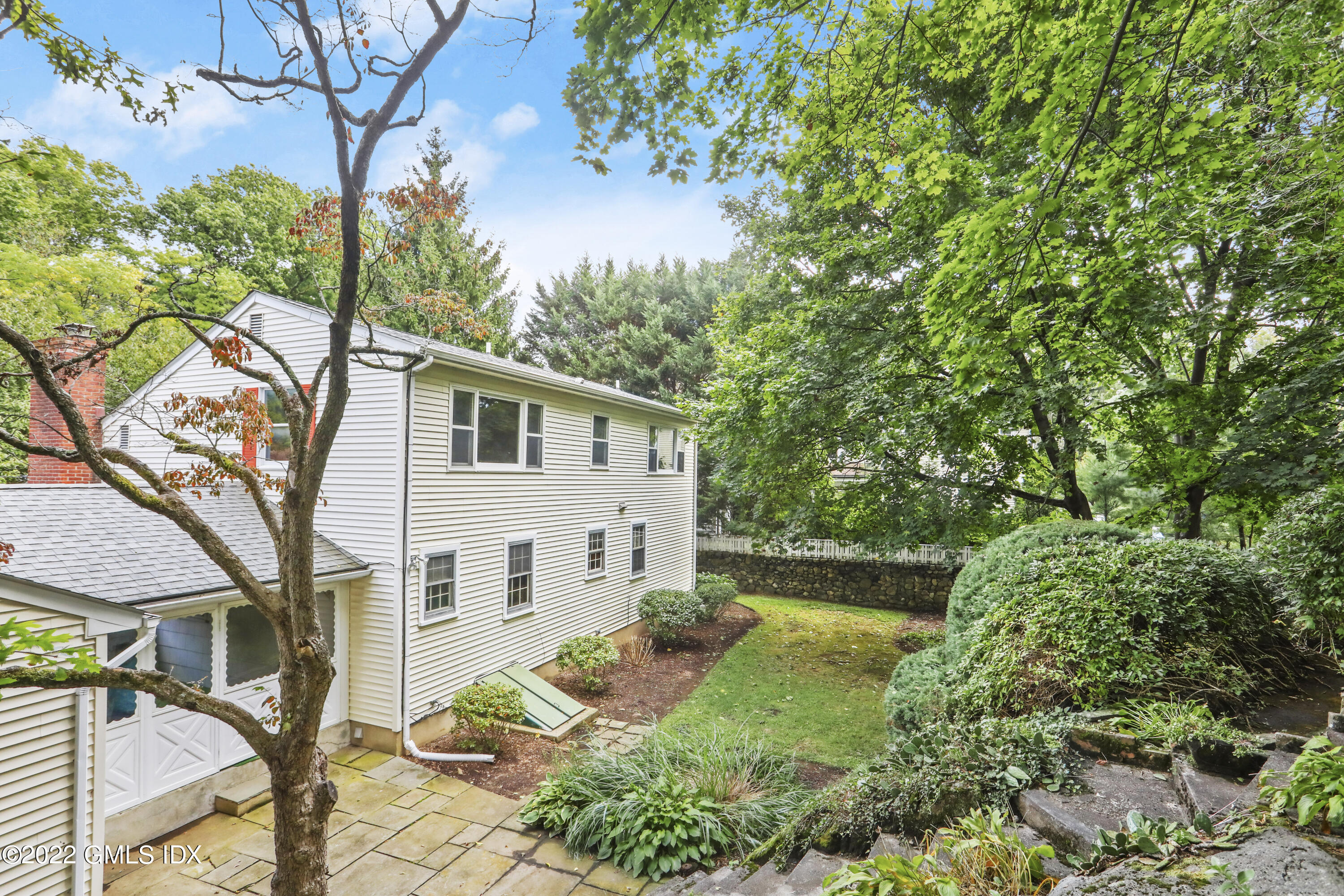 5 Skylark Road Greenwich, CT 06830 - Photo 14 of 21 a view of a house with a yard