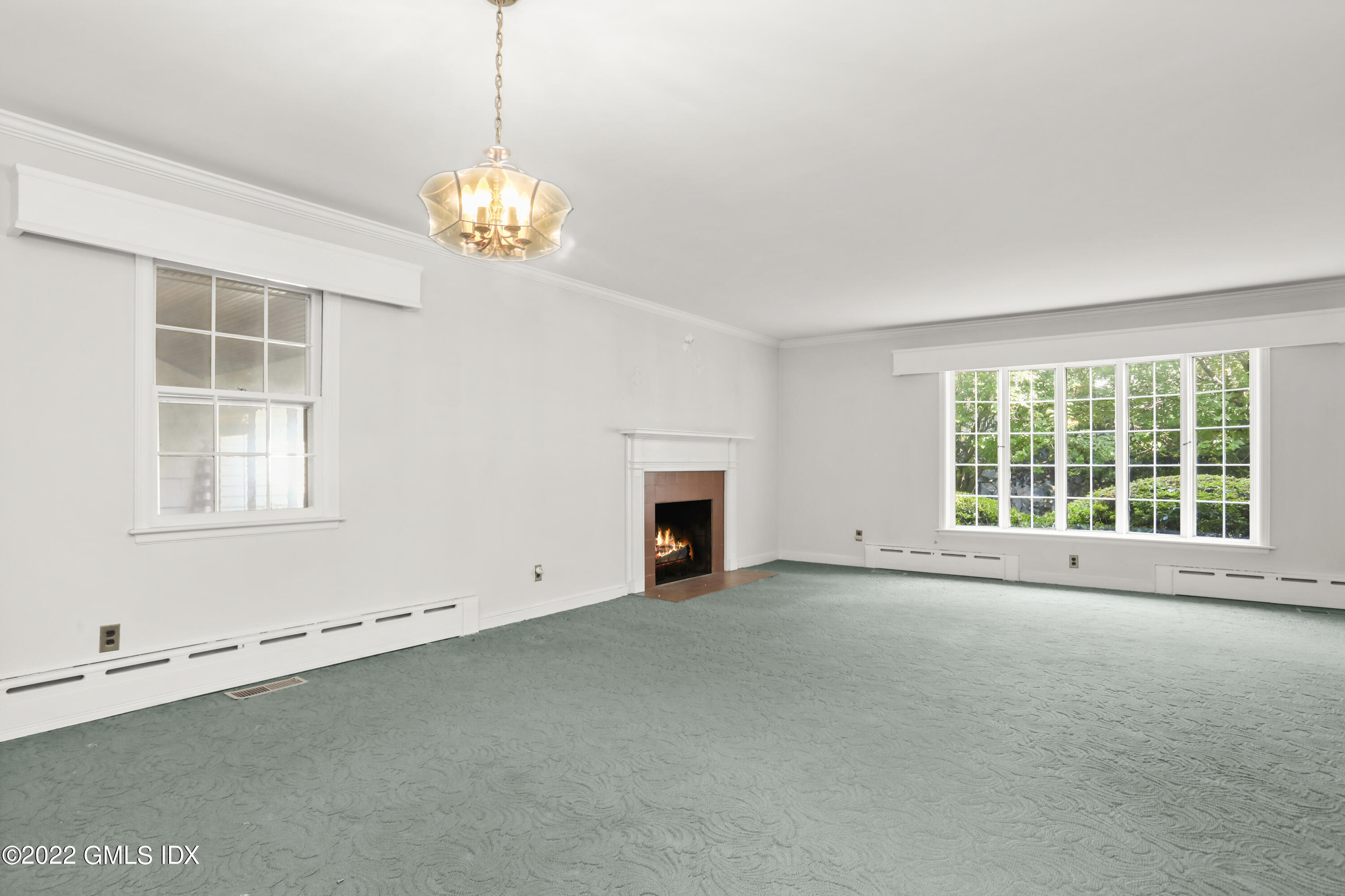 5 Skylark Road Greenwich, CT 06830 - Photo 3 of 21 a view of an empty room with a window