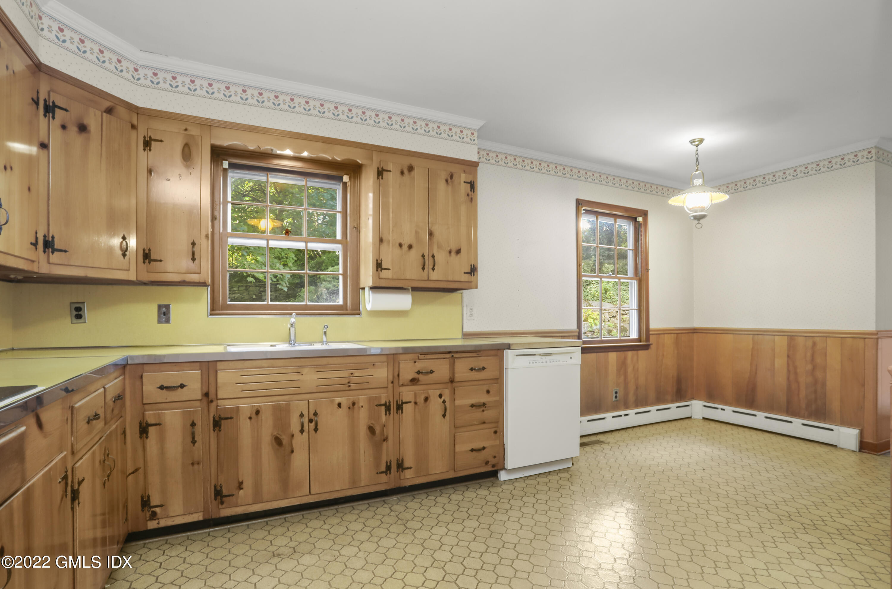 5 Skylark Road Greenwich, CT 06830 - Photo 5 of 21 a view of a kitchen with wooden floor and electronic appliances