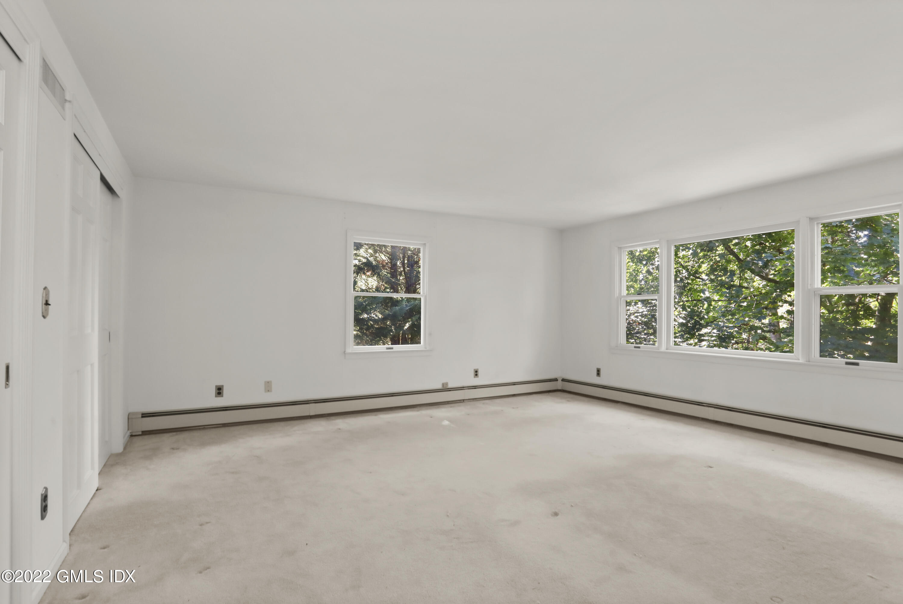 5 Skylark Road Greenwich, CT 06830 - Photo 9 of 21 an empty room with a empty space and window