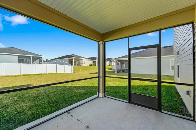 a view of swimming pool with a yard