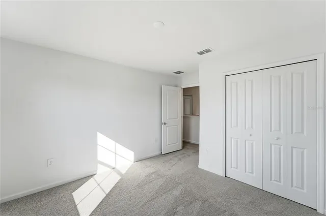 a view of a room with an empty space