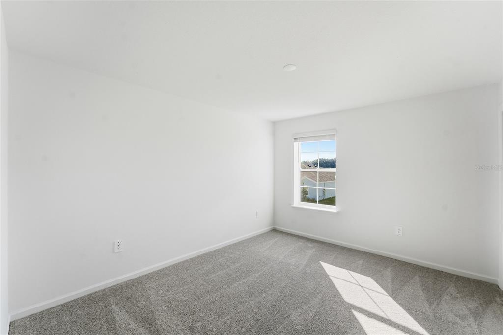 6680 Southwest 89th Loop Ocala, FL 34476 - Photo 30 of 39 a view of an empty room with a window