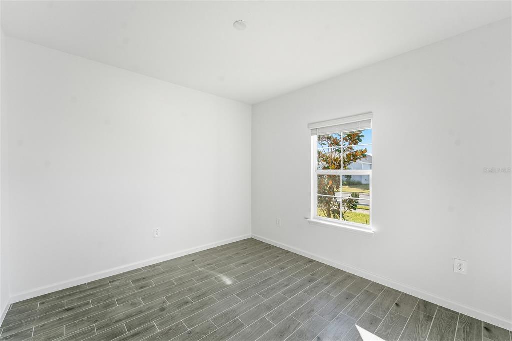 6680 Southwest 89th Loop Ocala, FL 34476 - Photo 35 of 39 an empty room with a window