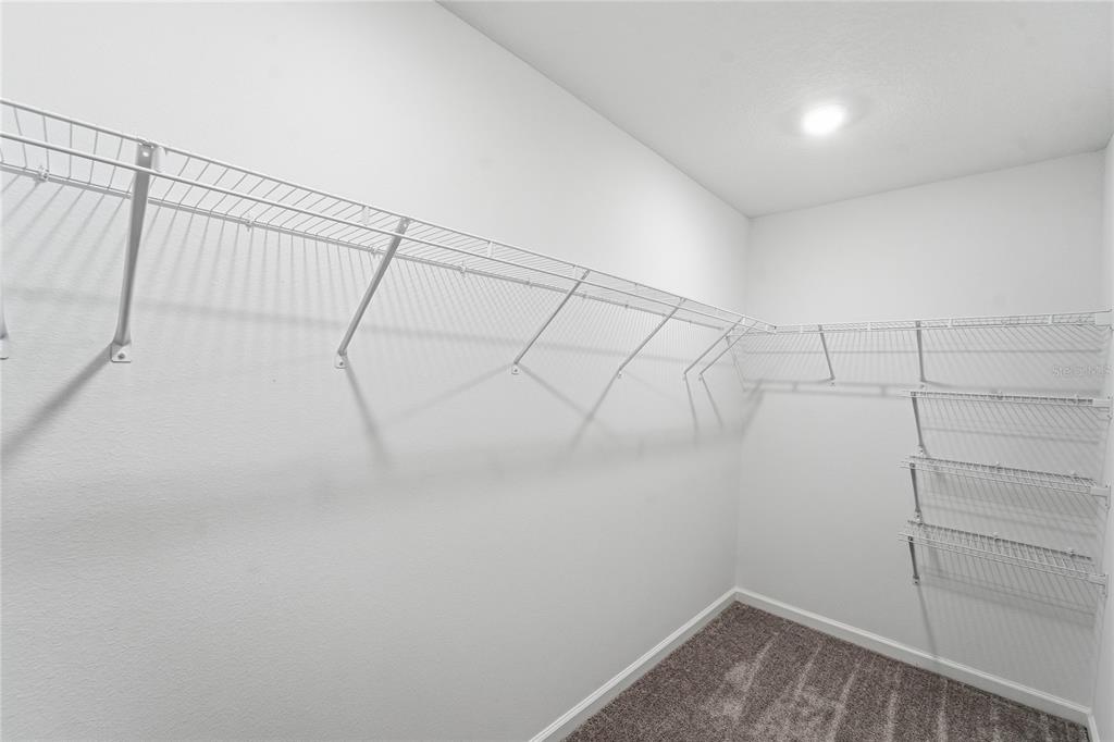 6680 Southwest 89th Loop Ocala, FL 34476 - Photo 36 of 39 a view of a room with racks on the wall