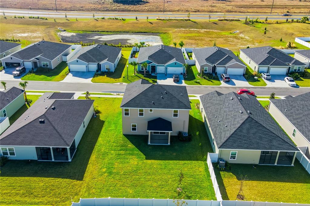 6680 Southwest 89th Loop Ocala, FL 34476 - Photo 7 of 39 a aerial view of houses with swimming pool