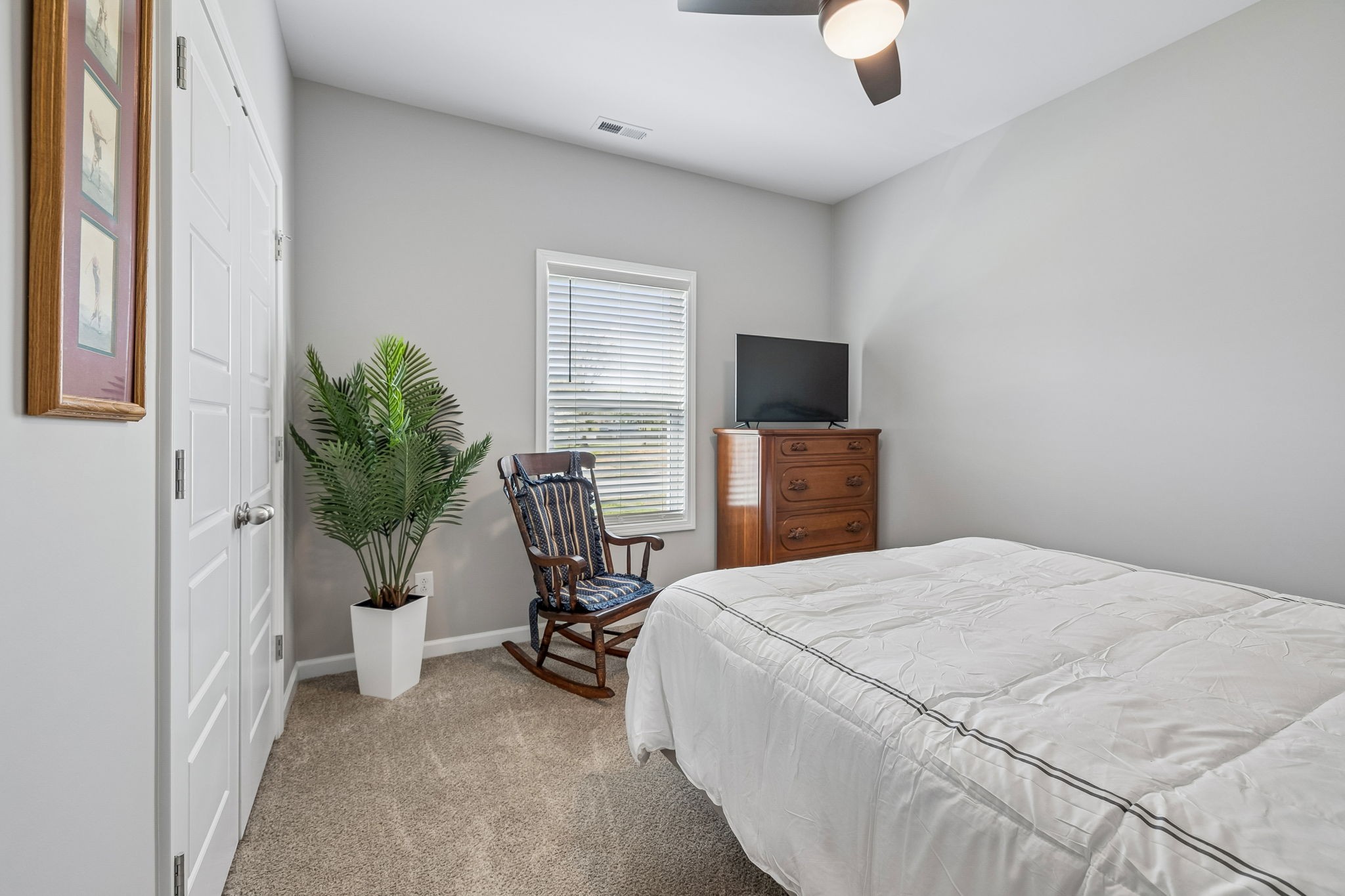 180 Vickers Hill Road Smithville, TN 37166 - Photo 22 of 33 a bedroom with a bed and a television