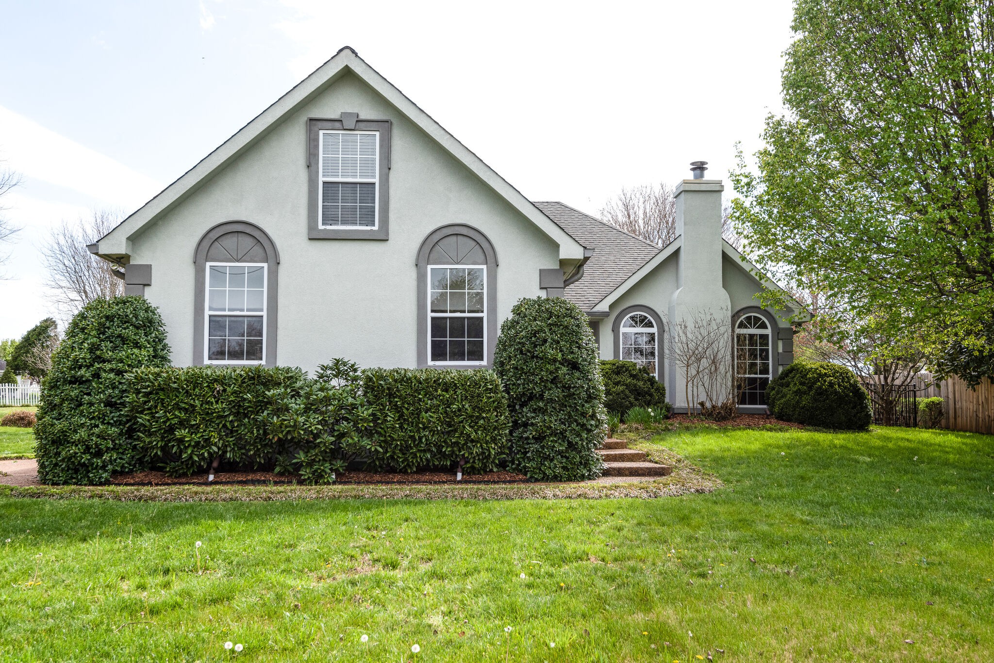 3944 Kedron Road Spring Hill, TN 37174 - Photo 1 of 31 a front view of a house with a yard and garage