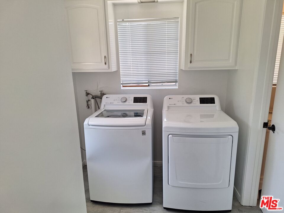 6446 Riggs Place Los Angeles, CA 90045 - Photo 12 of 22 a utility room with dryer and washer