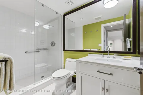 a balcony with table and chairs