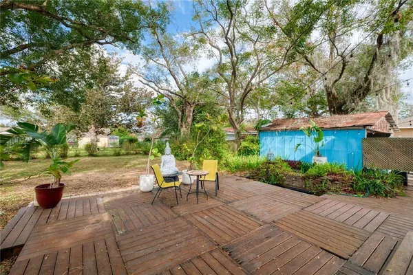 a view of a table and chairs in a patio