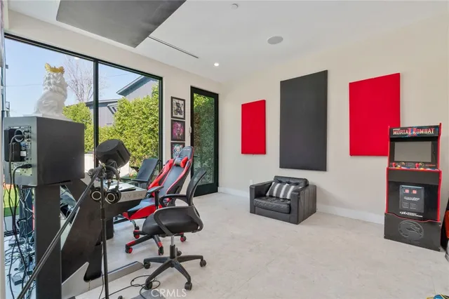 a room with furniture and a flat screen tv