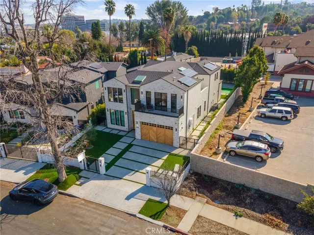 an aerial view of a house with garden
