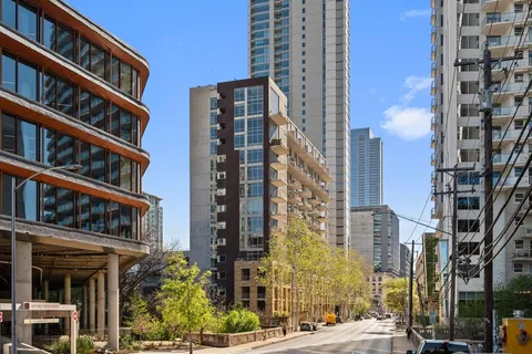 a view of a city with tall buildings