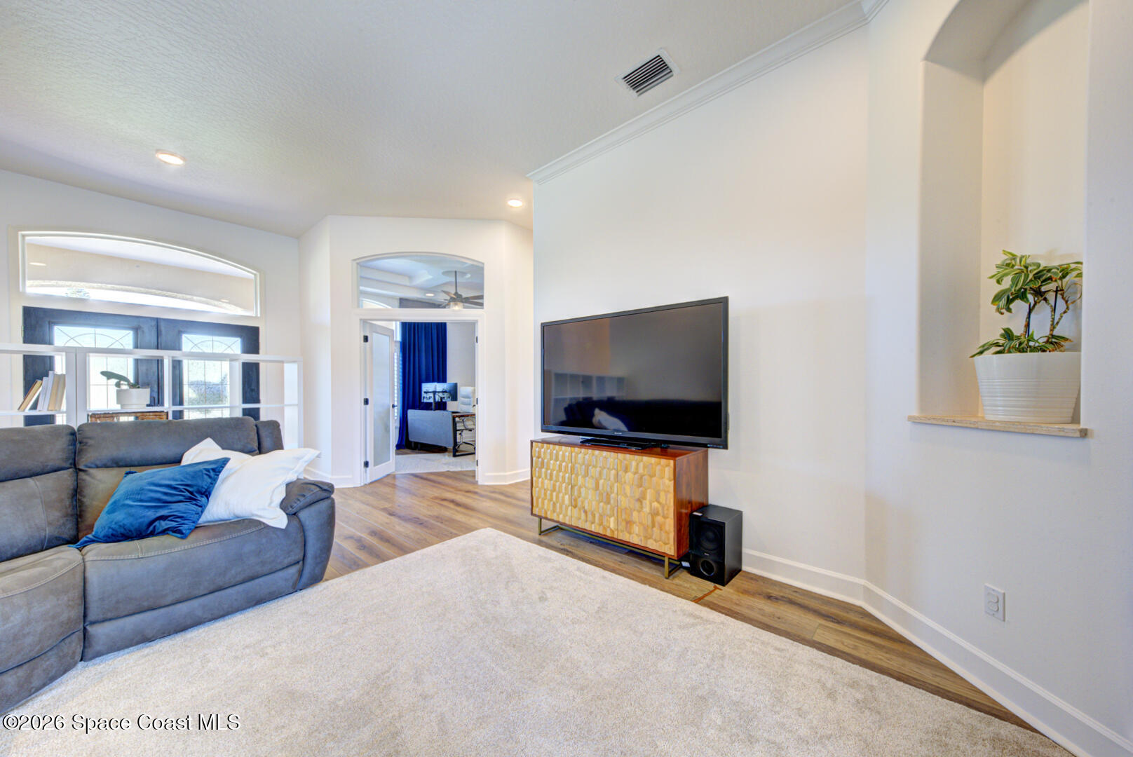4070 Stoney Point Road Melbourne, FL 32940 - Photo 7 of 78 living room with niche