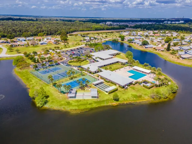 a view of a swimming pool with an ocean