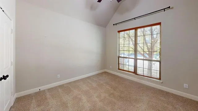 a bathroom with a tub a double vanity sink and mirror