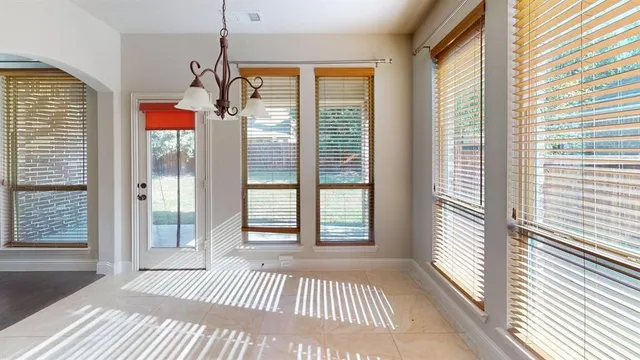 en view interior of a house with a chandelier fan