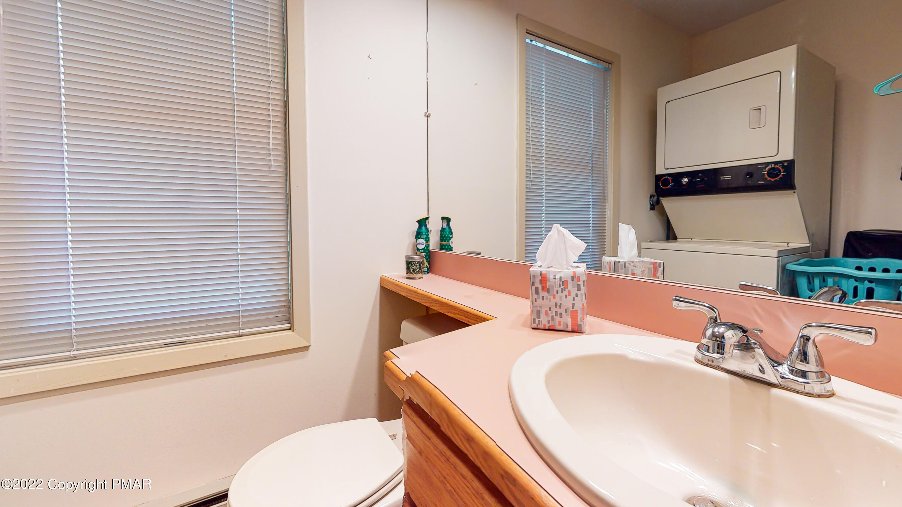2169 Oak Hill Drive Canadensis, PA 18325 - Photo 14 of 40 a bathroom with a granite countertop sink and a toilet