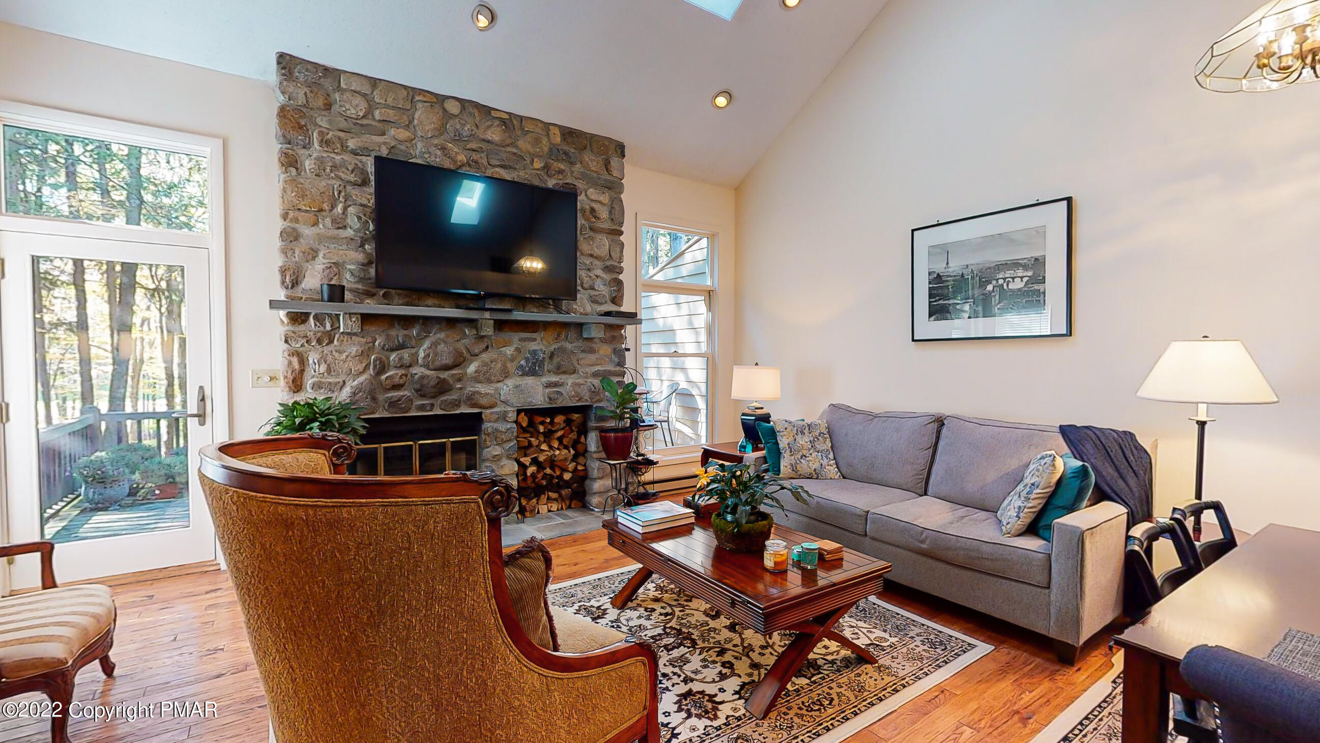 2169 Oak Hill Drive Canadensis, PA 18325 - Photo 2 of 40 a living room with fireplace furniture and a flat screen tv
