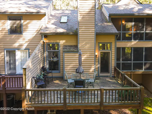 a view of a brick house with windows