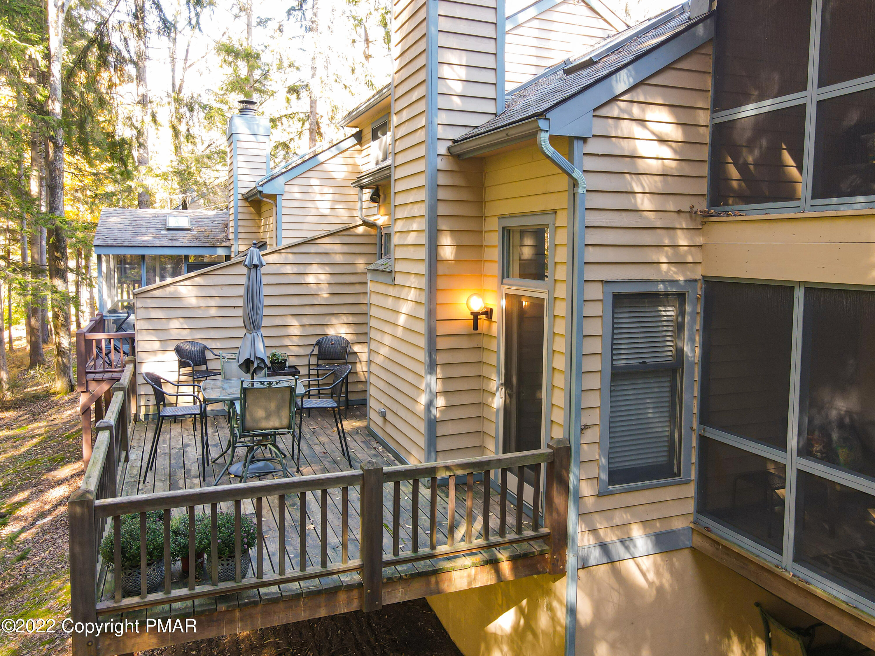 2169 Oak Hill Drive Canadensis, PA 18325 - Photo 28 of 40 a view of a balcony with two couches and wooden floor