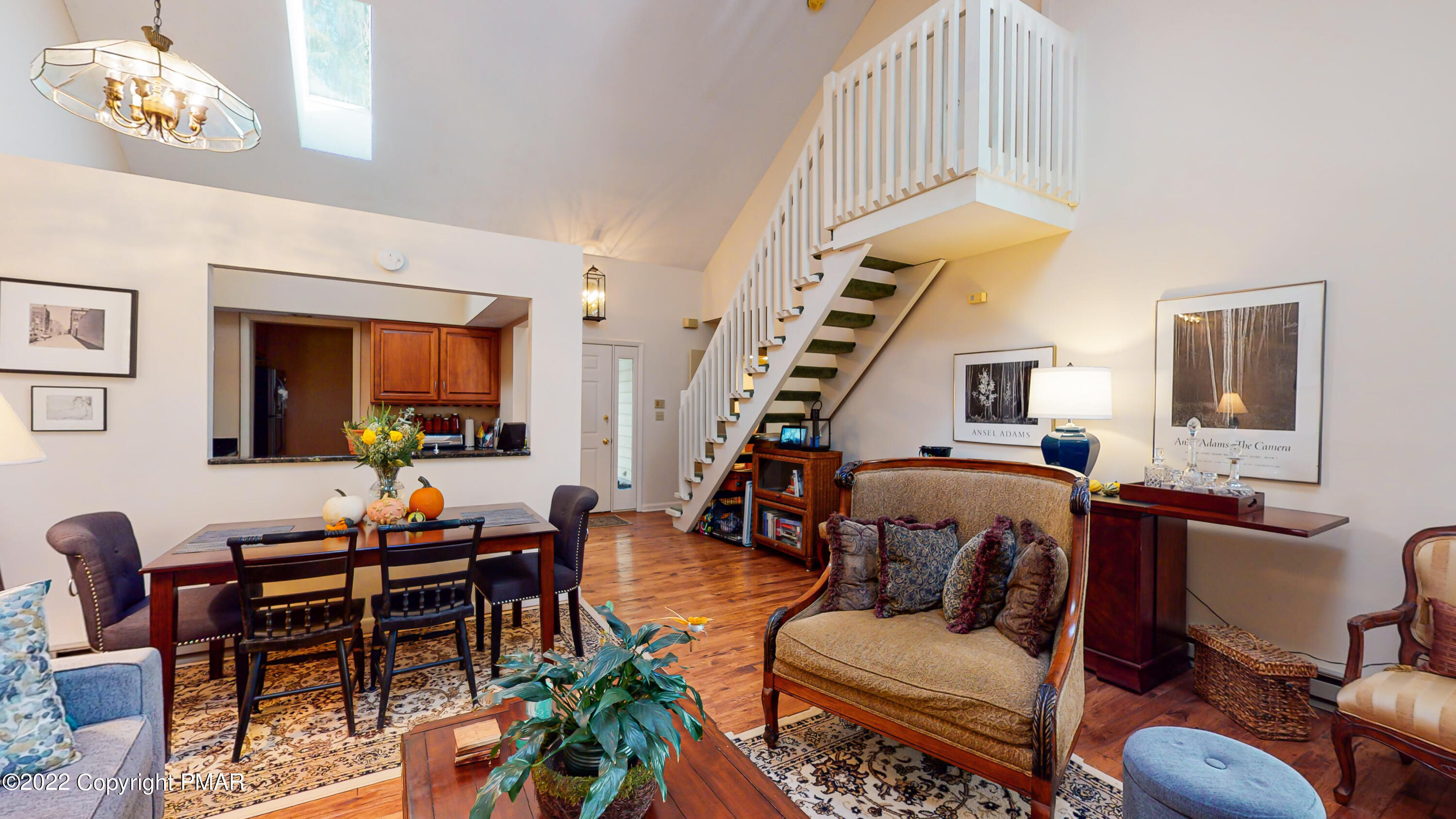 2169 Oak Hill Drive Canadensis, PA 18325 - Photo 5 of 40 a living room with furniture and a chandelier
