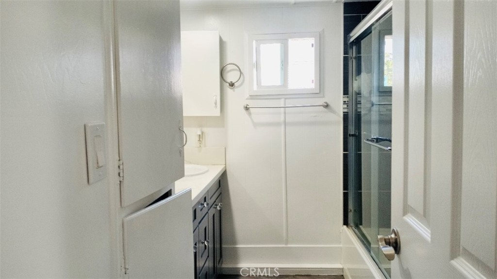26250 9th Street, Unit 131 Highland, CA 92346 - Photo 13 of 15 a bathroom with a bathtub and a shower