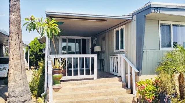 a view of a house with a small porch