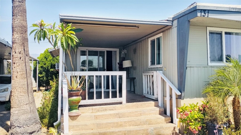 26250 9th Street, Unit 131 Highland, CA 92346 - Photo 6 of 15 a view of a house with a small porch