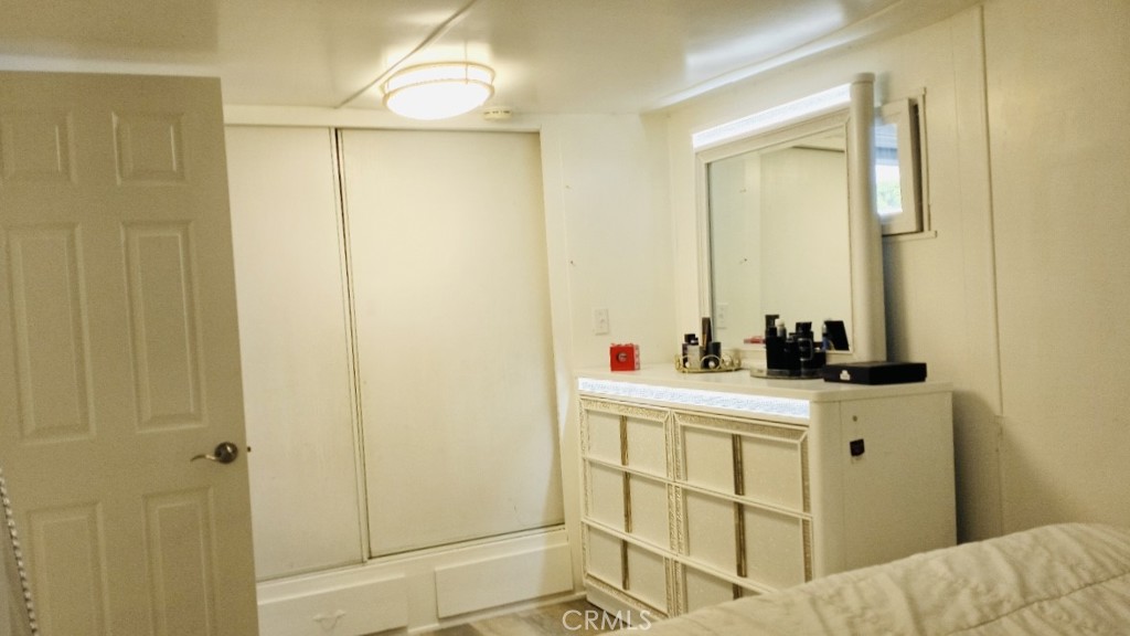 26250 9th Street, Unit 131 Highland, CA 92346 - Photo 9 of 15 a bathroom with a sink and a mirror