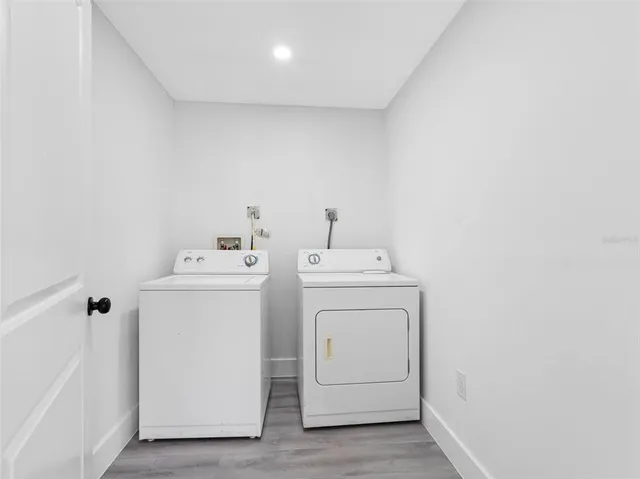 a utility room with dryer and washer