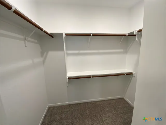 a view of a house with wooden floor and a yard