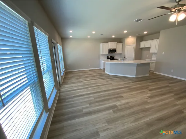 a view of kitchen and sink