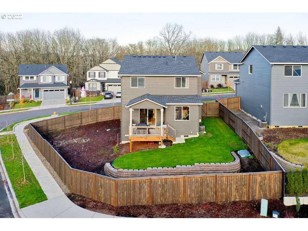 2620 South 12th Court Ridgefield, WA 98642 - Photo 20 of 20 a view of a house with a swimming pool