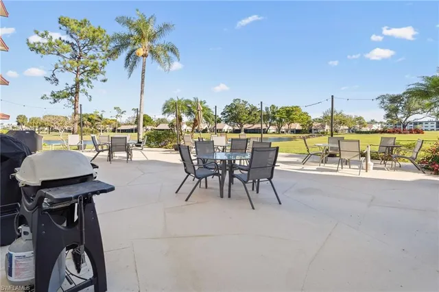 a view of a terrace with furniture and garden