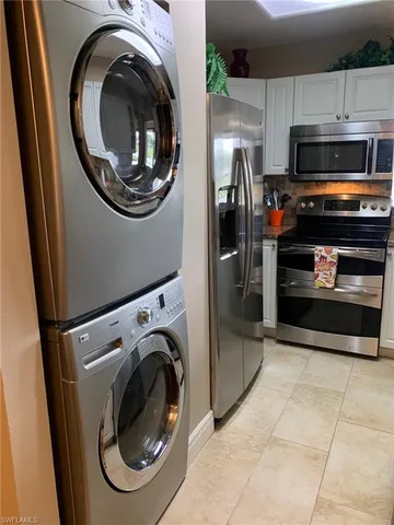 a view of kitchen and washer and dryer