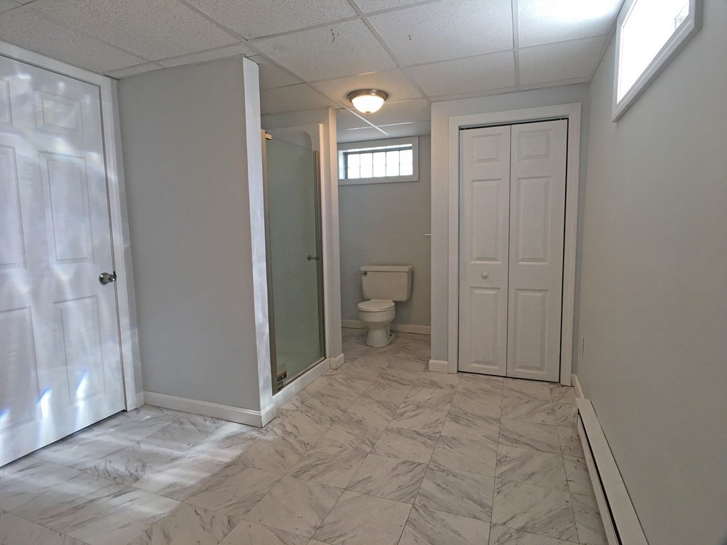 71 Kennedy Street Fall River, MA 02721 - Photo 20 of 28 a view of a bathroom with a toilet and a sink