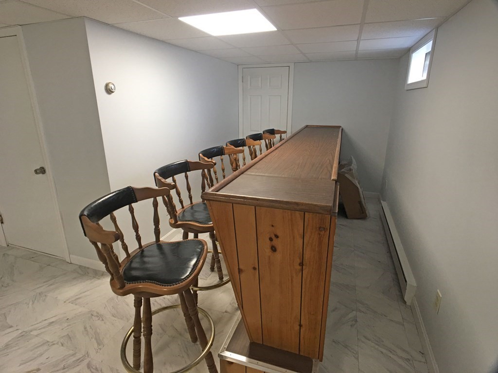 71 Kennedy Street Fall River, MA 02721 - Photo 23 of 28 a balcony with table and chairs