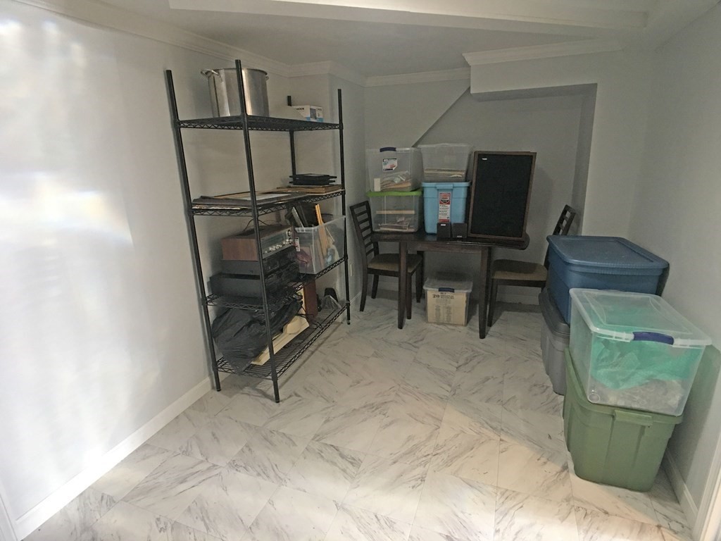 71 Kennedy Street Fall River, MA 02721 - Photo 26 of 28 a view of a room with furniture and wooden floor