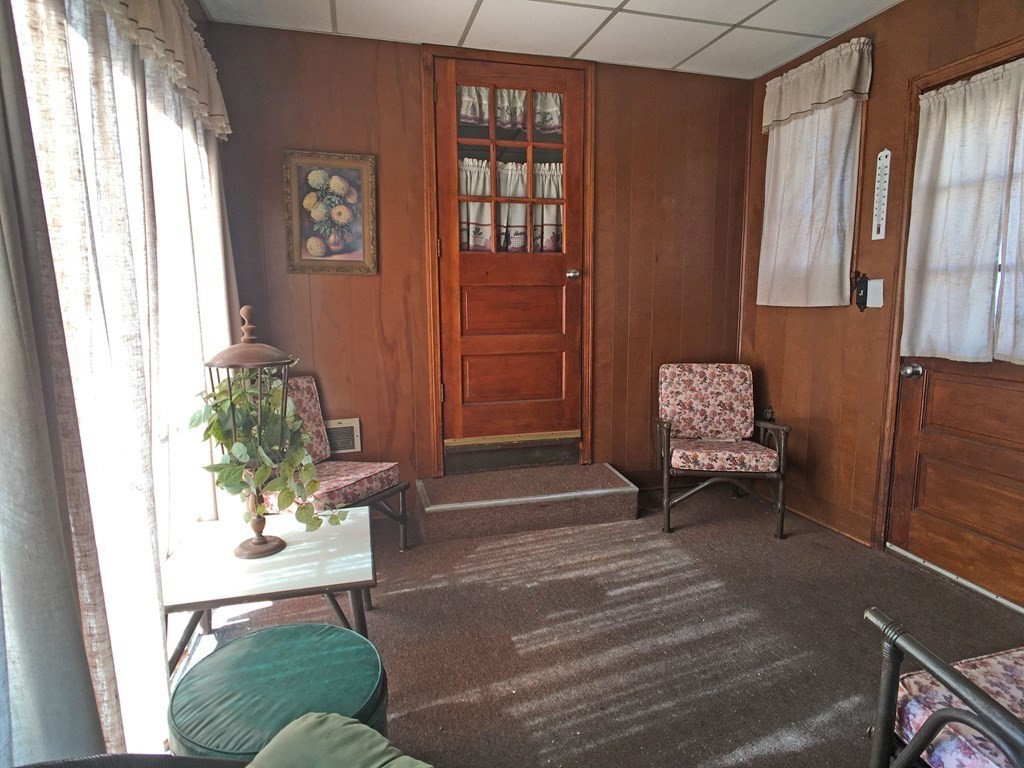 71 Kennedy Street Fall River, MA 02721 - Photo 27 of 28 a living room with furniture and a window