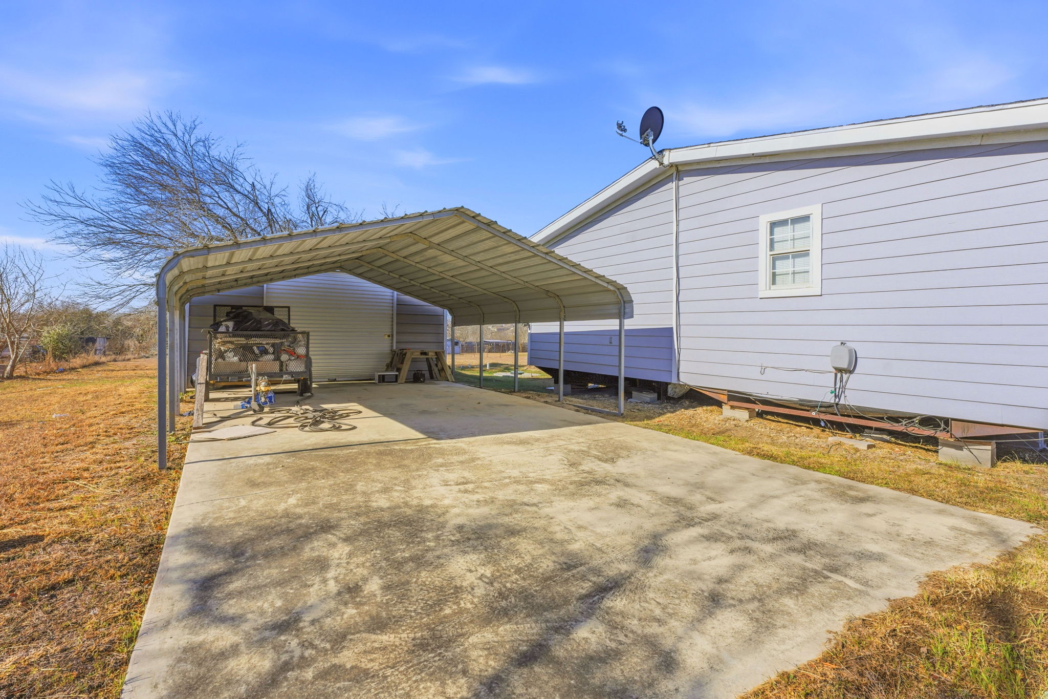 110 Cotton Gin Road Kyle, TX 78640 - Photo 12 of 22 a view of a house with pool and sitting area