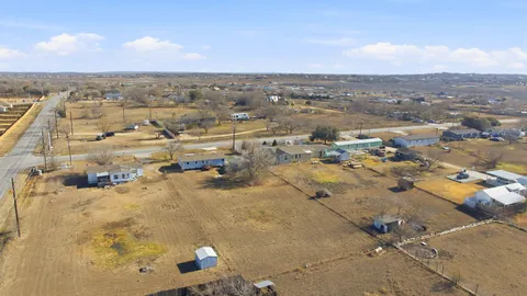 an aerial view of residential building with parking space