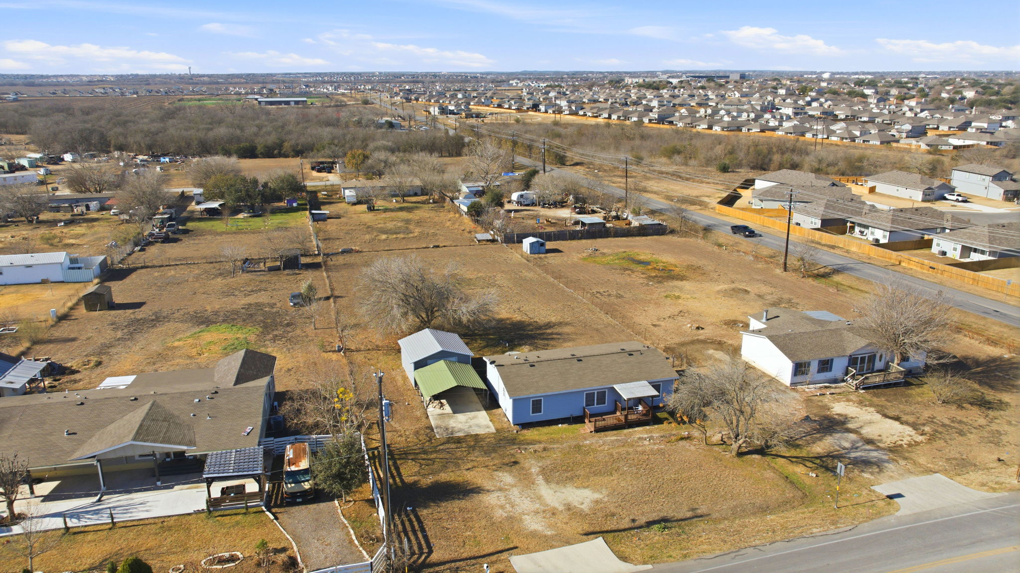 110 Cotton Gin Road Kyle, TX 78640 - Photo 21 of 22 an aerial view of residential houses with outdoor space