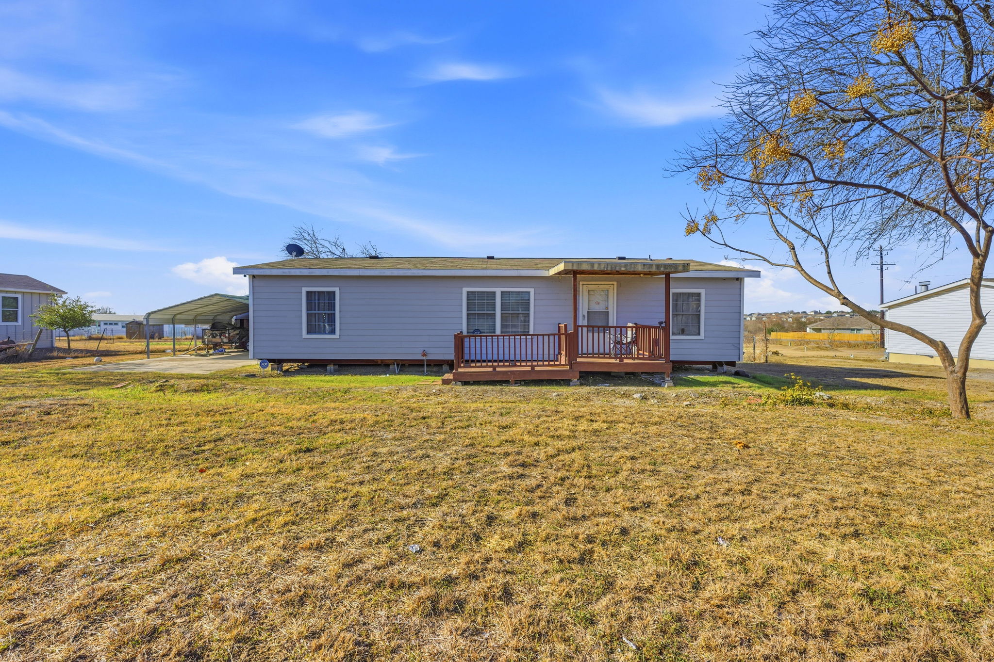 110 Cotton Gin Road Kyle, TX 78640 - Photo 8 of 22 a view of a house with a yard