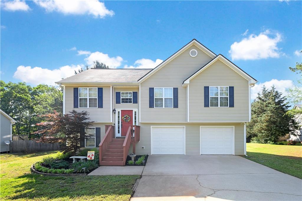 6790 Pea Ridge Road Gainesville, GA 30506 - Photo 1 of 1 a front view of a house with garden