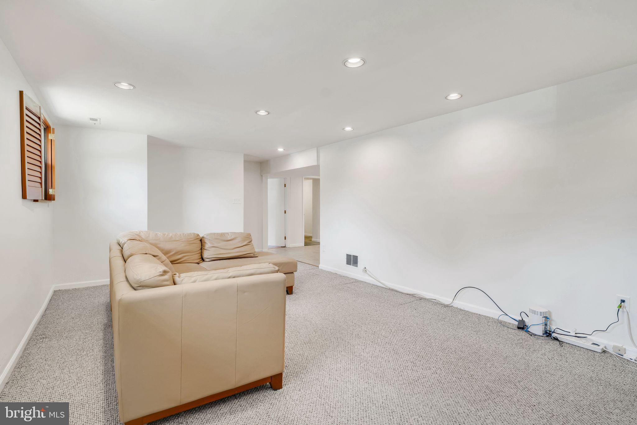 4552 Kinmount Road Lanham, MD 20706 - Photo 34 of 55 a room with storage and utility
